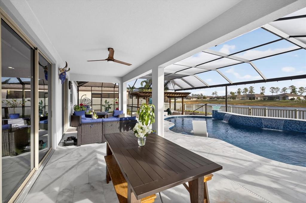 12740 Palapa Loop Spring Hill, FL 34610 - Photo 48 of 68 a view of a living room and entryway
