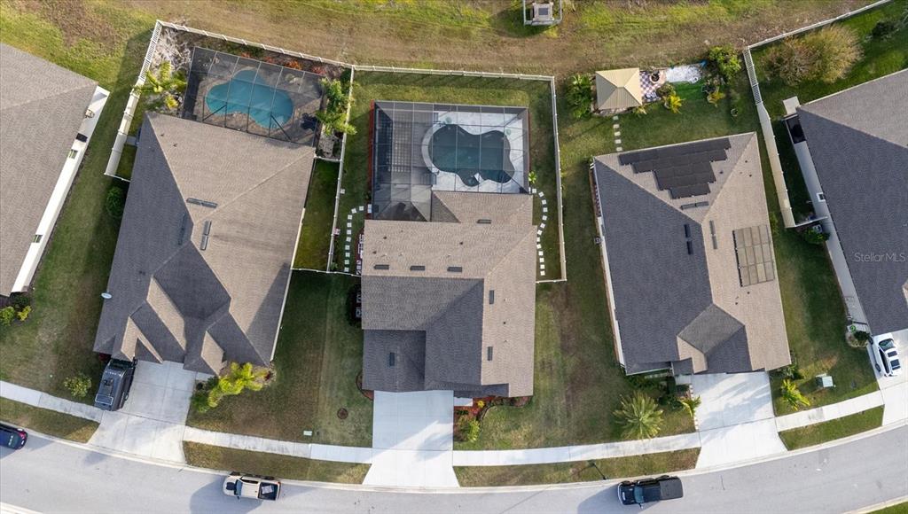 12740 Palapa Loop Spring Hill, FL 34610 - Photo 5 of 68 an aerial view of a house