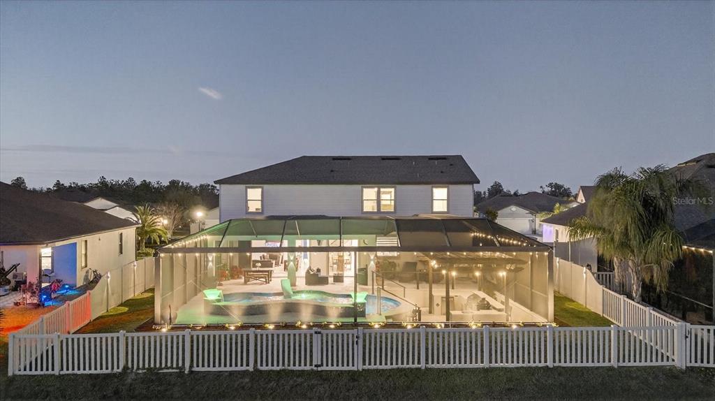 12740 Palapa Loop Spring Hill, FL 34610 - Photo 61 of 68 a front view of a house with a yard