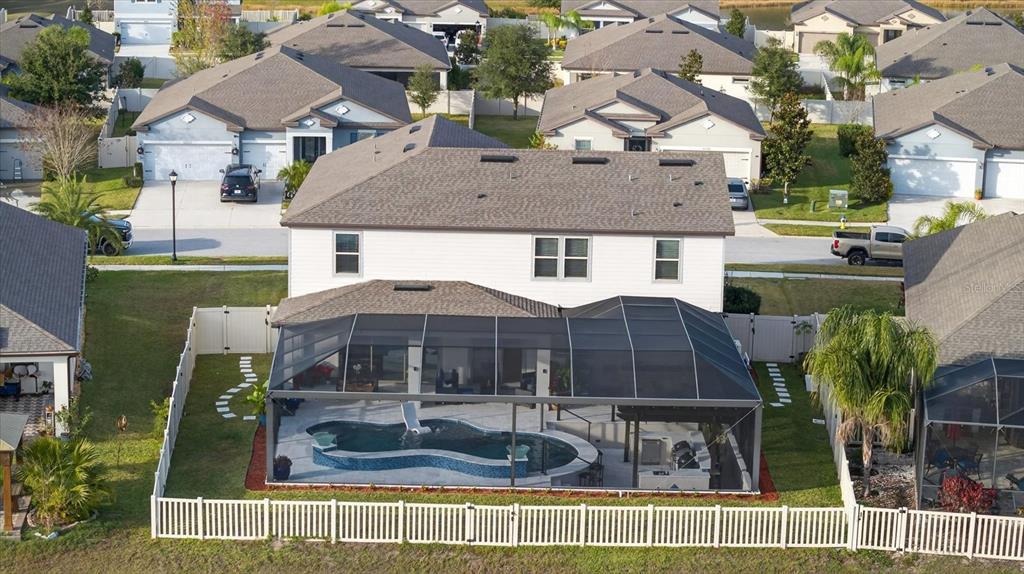 12740 Palapa Loop Spring Hill, FL 34610 - Photo 7 of 68 a front view of a house with a yard