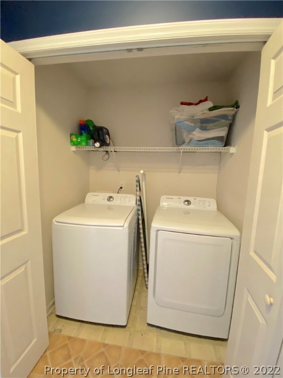 271 Stone Cross Drive Spring Lake, NC 28390 - Photo 17 of 38 a utility room with dryer and washer