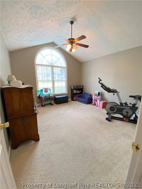 271 Stone Cross Drive Spring Lake, NC 28390 - Photo 22 of 38 a living room with furniture and a flat screen tv