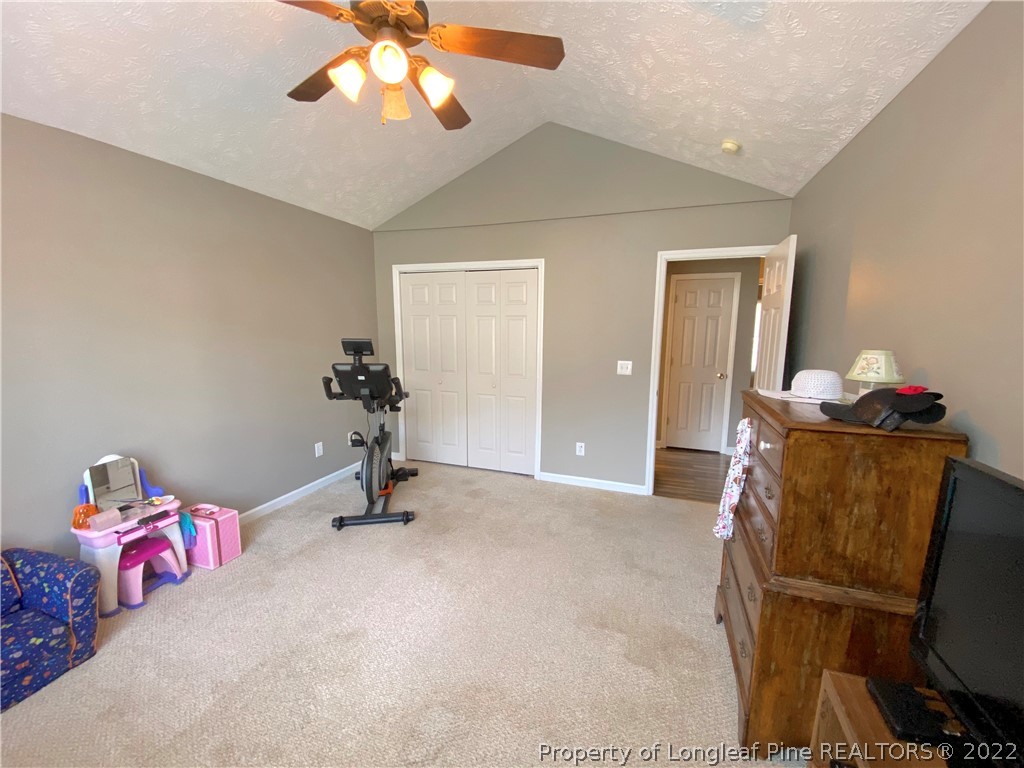 271 Stone Cross Drive Spring Lake, NC 28390 - Photo 23 of 38 a view of a room with gym equipment