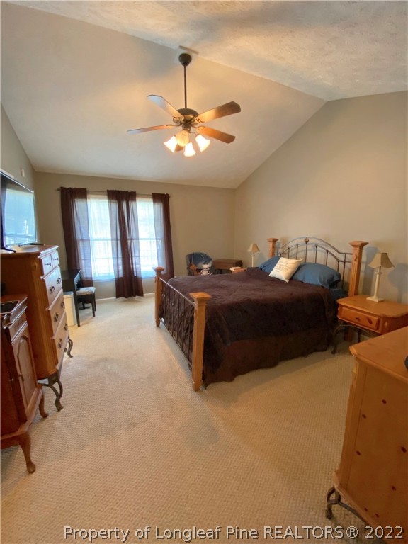 271 Stone Cross Drive Spring Lake, NC 28390 - Photo 27 of 38 a bedroom with bed and window
