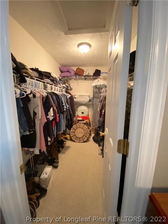 271 Stone Cross Drive Spring Lake, NC 28390 - Photo 28 of 38 a view of a room with gym equipment