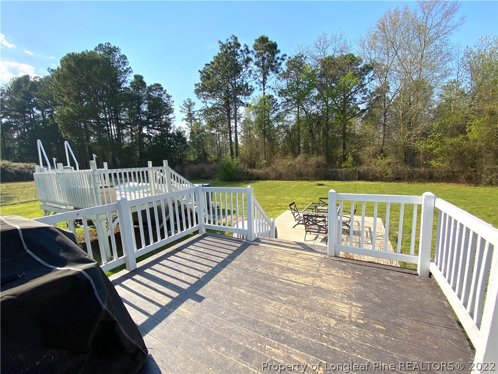 271 Stone Cross Drive Spring Lake, NC 28390 - Photo 37 of 38 a view of stairs and wooden floor