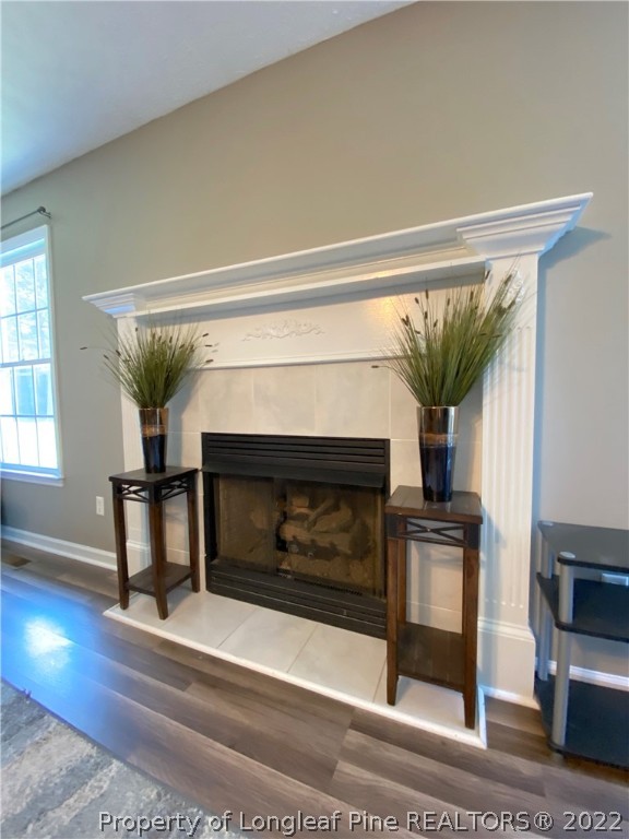 271 Stone Cross Drive Spring Lake, NC 28390 - Photo 9 of 38 a living room with furniture and a fireplace