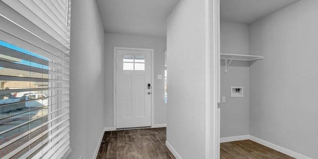 211 Hamilton Pool Lane Bastrop, TX 78602 - Photo 10 of 11 a view of bedroom with wooden floor