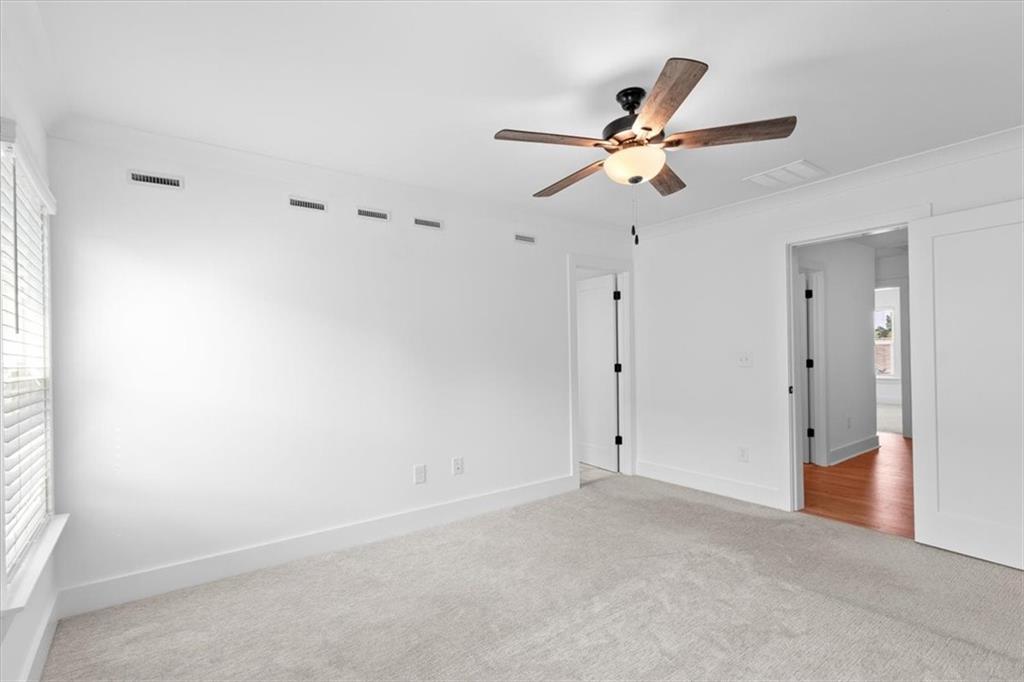3376 Macaiva Alley Avondale Estates, GA 30002 - Photo 19 of 42 a view of empty room with ceiling fan