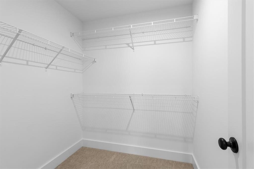 3376 Macaiva Alley Avondale Estates, GA 30002 - Photo 24 of 42 a view of a room with racks on the wall