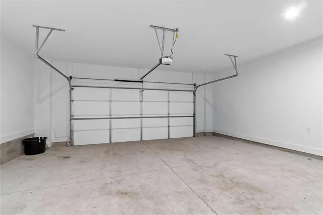 a view of a city from a balcony with furniture