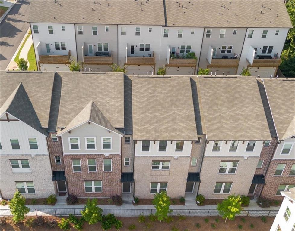 3376 Macaiva Alley Avondale Estates, GA 30002 - Photo 41 of 42 a large building with a street