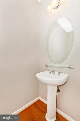 a bathroom with a bathtub and a sink