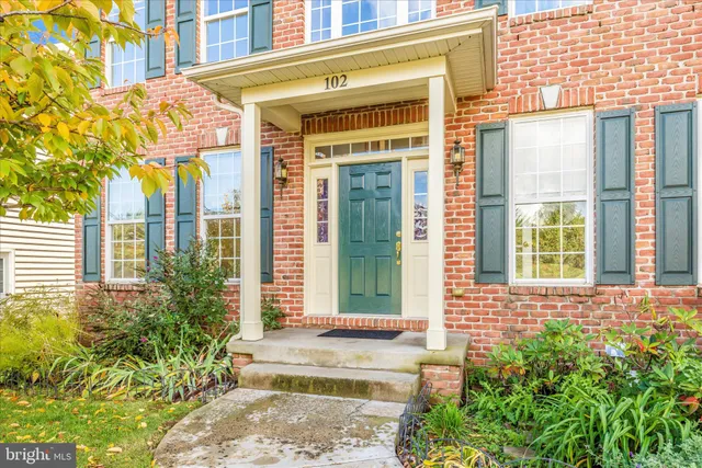 a view of a brick building with a entrance door
