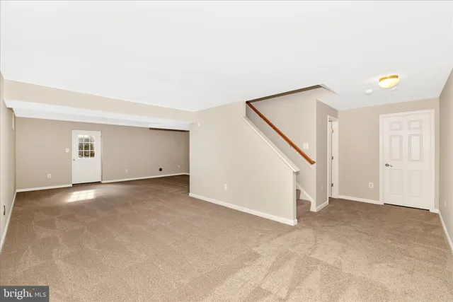 a view of a wooden deck with a yard