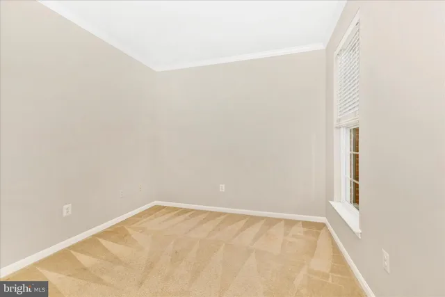 a view of an empty room with window