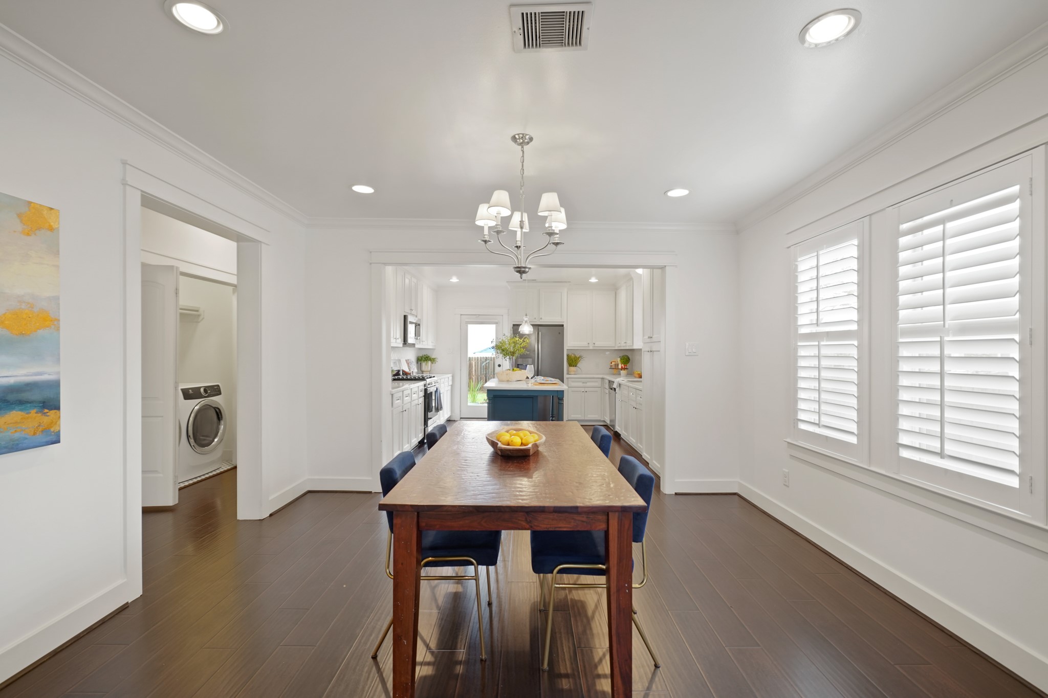 1311 Walton Street Houston, TX 77009 - Photo 12 of 43 With direct access to the kitchen, the dining area offers a smooth workflow that makes serving and gathering effortless.