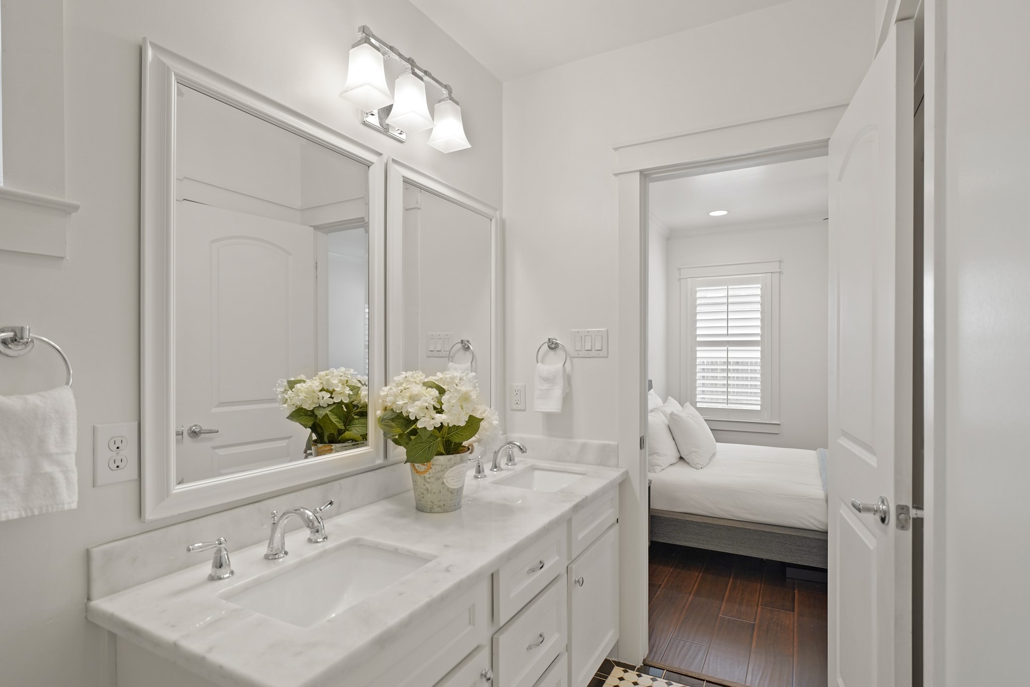 1311 Walton Street Houston, TX 77009 - Photo 24 of 43 Accessed through the bathroom, the walk-in closet to the right offers built-in shelving and generous space to keep everything neatly organized.