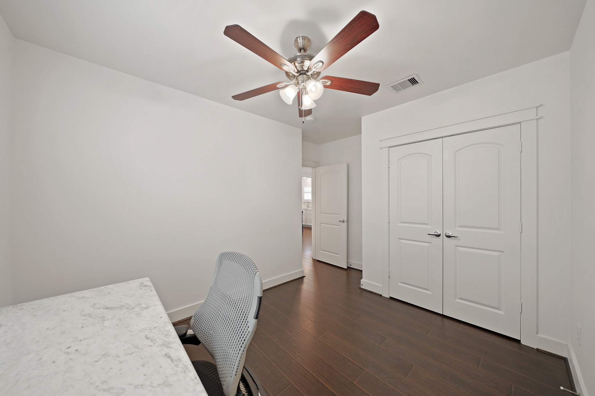 1311 Walton Street Houston, TX 77009 - Photo 26 of 43 A double-door closet offers convenient storage space for the bedroom and just outside the bedroom is access to the second bath.