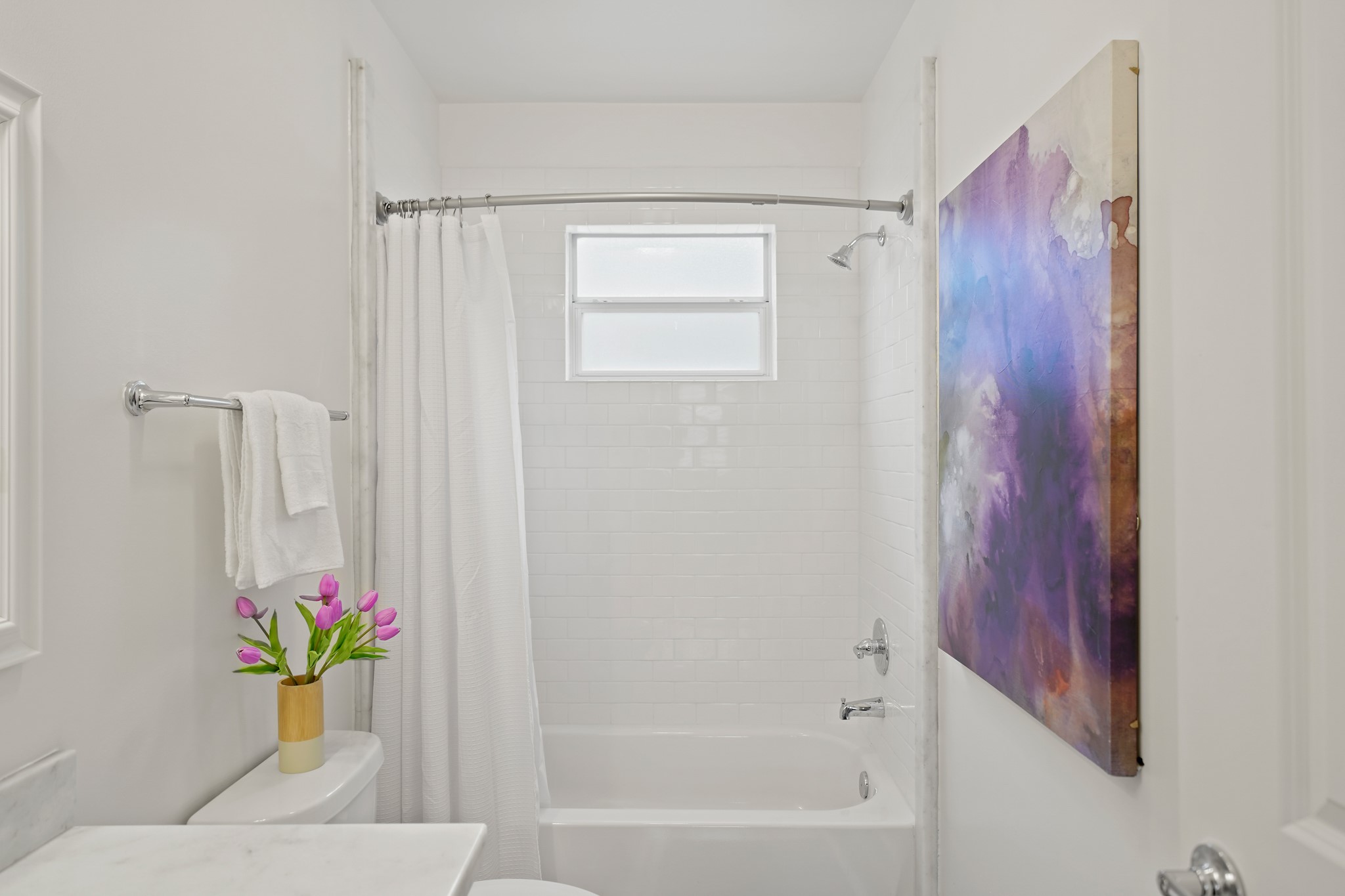 1311 Walton Street Houston, TX 77009 - Photo 29 of 43 The shower is surrounded by floor-to-ceiling subway tile offering a polished look with timeless appeal. The shower also features new plumbing fixtures.