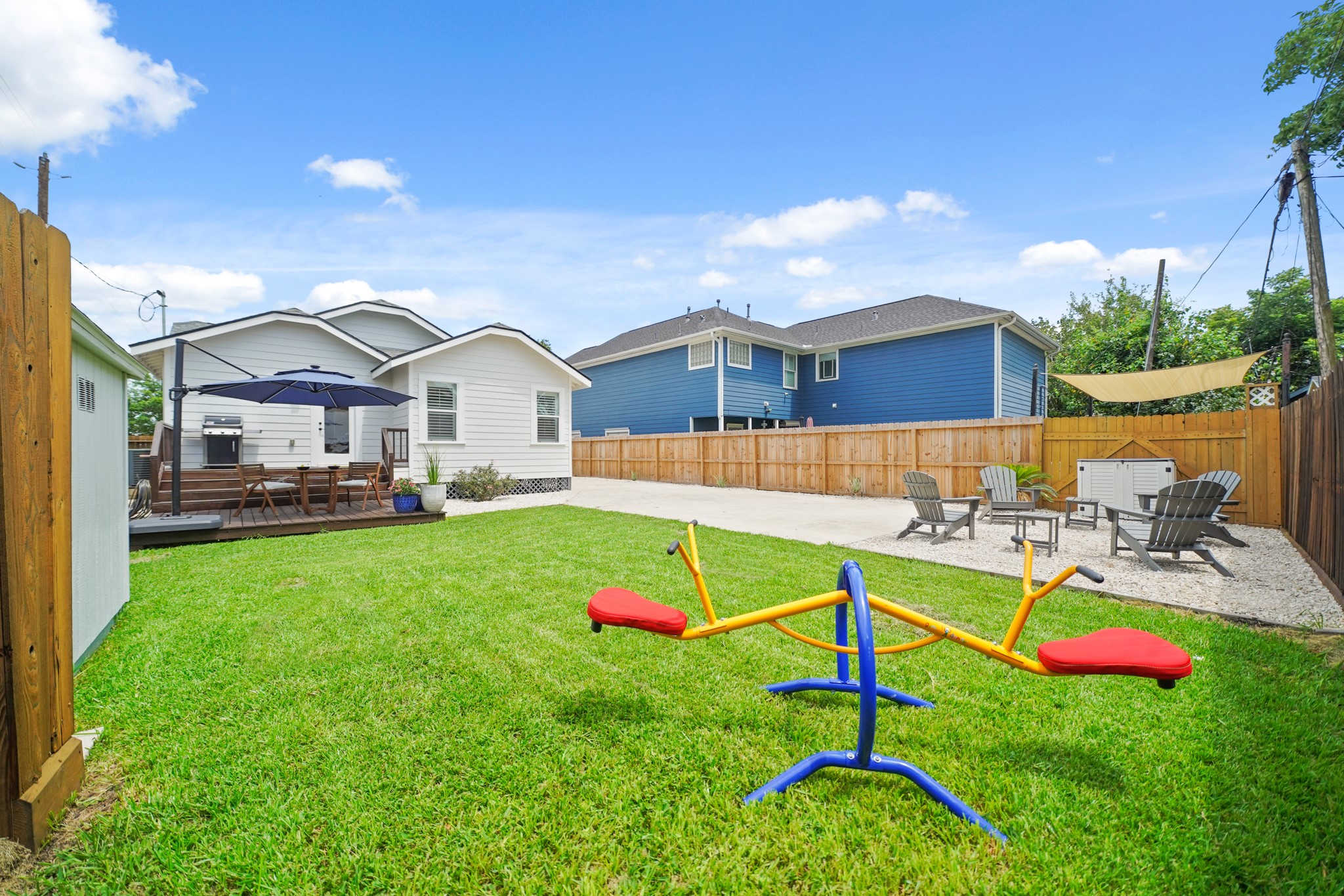 1311 Walton Street Houston, TX 77009 - Photo 32 of 43 Step out and enjoy a spacious, landscaped yard with plenty of space to relax, garden, or let kids and pets play freely.