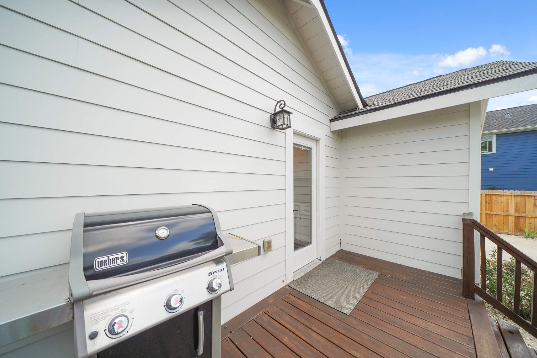 1311 Walton Street Houston, TX 77009 - Photo 39 of 43 A nearby patio door connects the 14’ x 6’ upper deck to the kitchen, making outdoor dining and entertaining smooth and convenient.