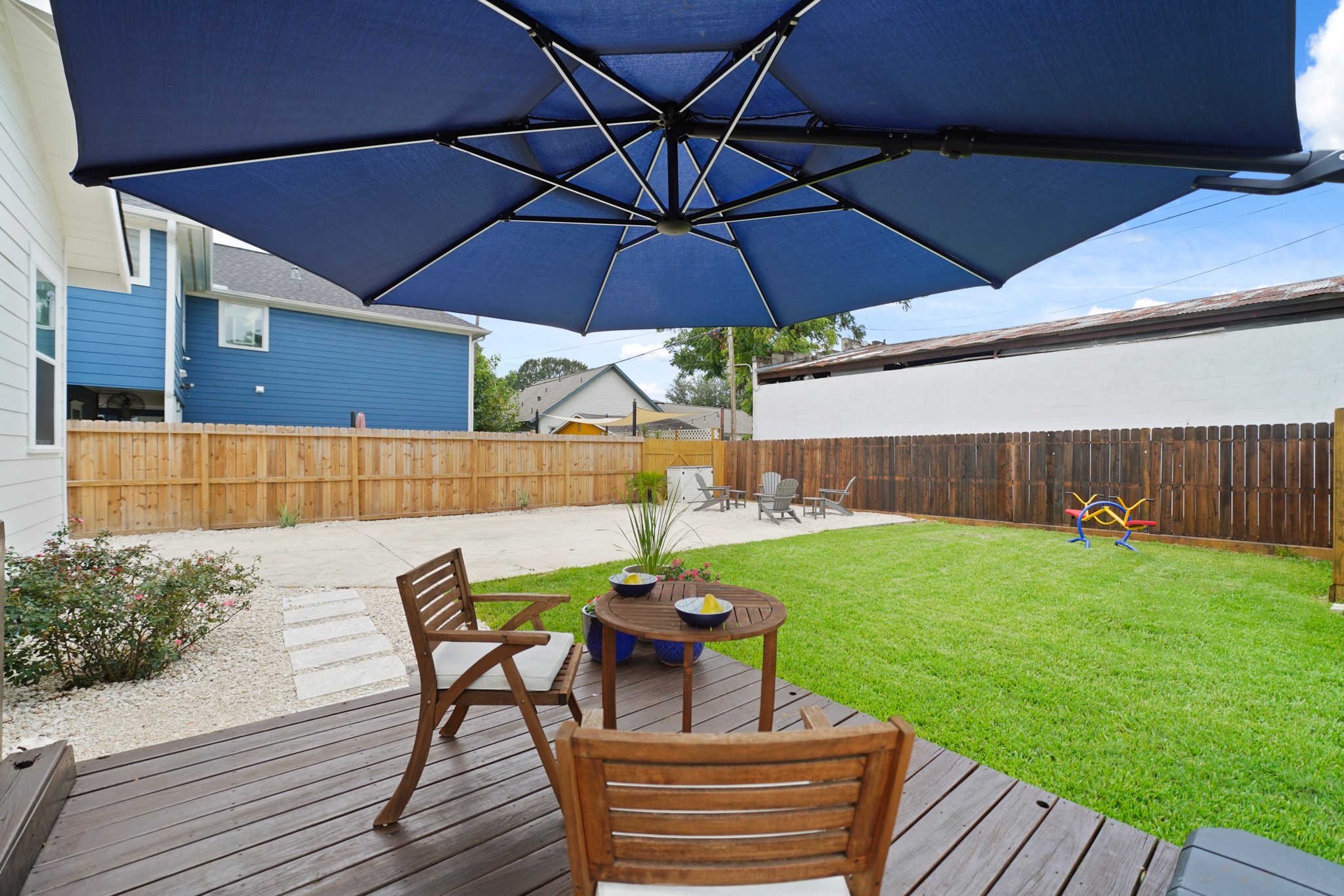 1311 Walton Street Houston, TX 77009 - Photo 41 of 43 Whether you're planning a garden, play area, or simply looking for space to enjoy the sunshine, the backyard offers plenty of space to make it yours.
