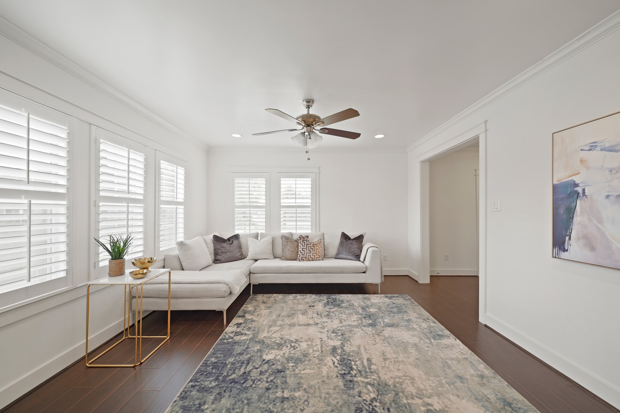 1311 Walton Street Houston, TX 77009 - Photo 7 of 43 Numerous windows with stately plantation shutters throw cascading light into the entire front of the home.