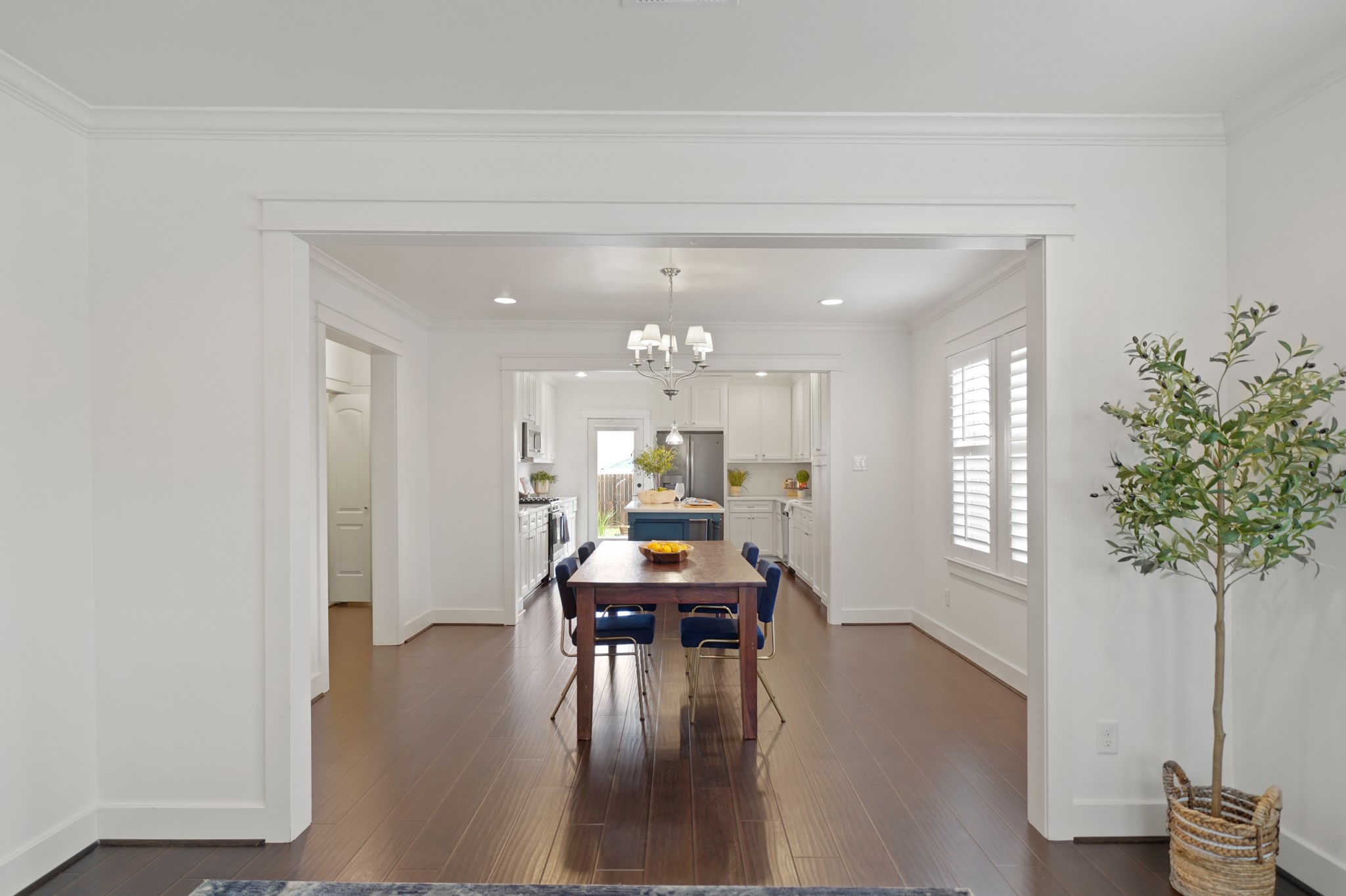 1311 Walton Street Houston, TX 77009 - Photo 9 of 43 The living room opens seamlessly to the dining area, an ideal layout for casual or formal meals, weekend downtime, or quality time with loved ones.