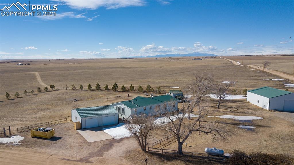 4270 Oil Well Road Yoder, CO 80864 - Photo 1 of 42 A nice square 40 Acres. Stucco Exterior on the home. 50x40 barn. 30x30 garage.