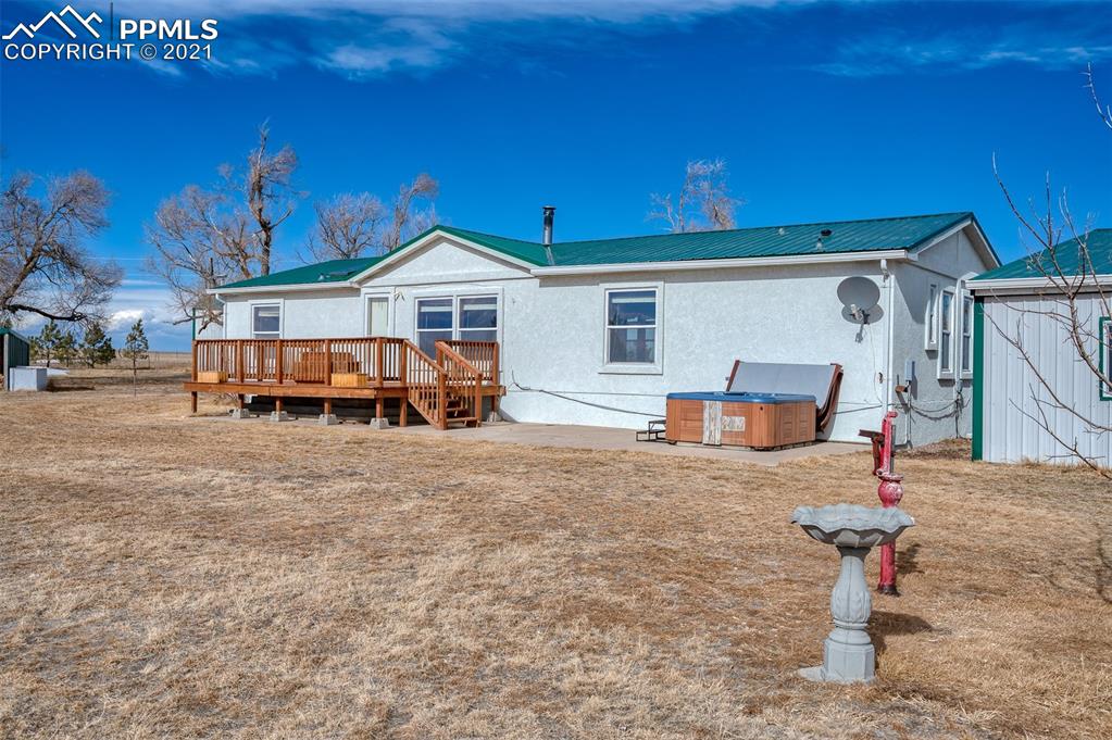 4270 Oil Well Road Yoder, CO 80864 - Photo 2 of 42 Enjoy wide open spaces, privacy, hot tub, and large back deck.
