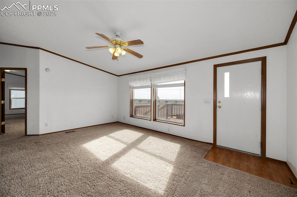4270 Oil Well Road Yoder, CO 80864 - Photo 13 of 42 Front entry with the master bedroom to the left.