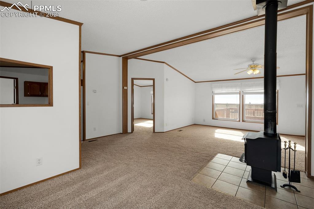 4270 Oil Well Road Yoder, CO 80864 - Photo 16 of 42 This photo is from the dining area looking into the master bedroom.