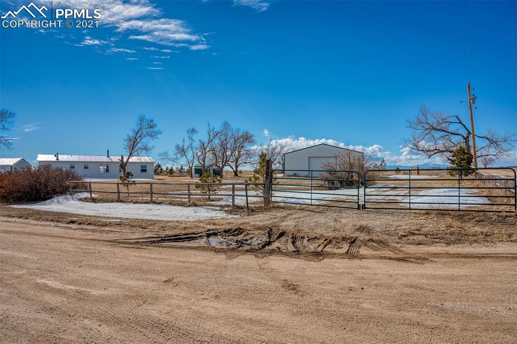 4270 Oil Well Road Yoder, CO 80864 - Photo 32 of 42 The property has 2 entrances. One to the shed, and the second to the front of the house and garage.