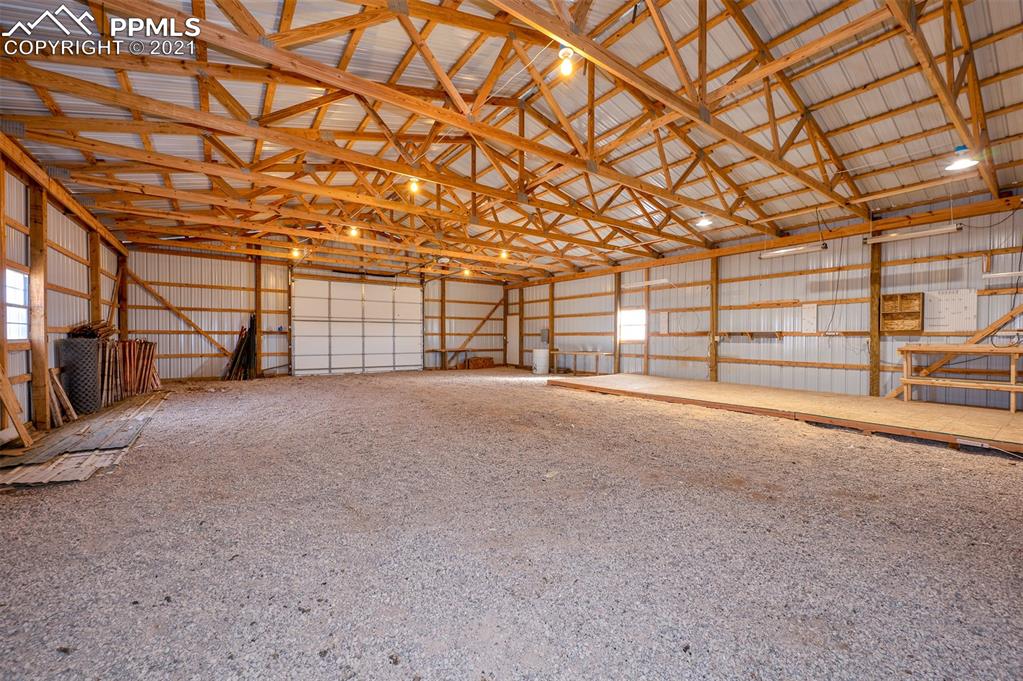 4270 Oil Well Road Yoder, CO 80864 - Photo 5 of 42 Inside the shop. You can see the work area on the right side.
