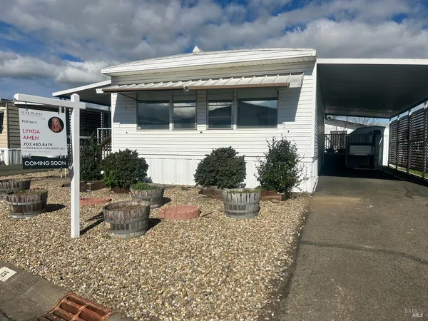 a front view of a house with patio