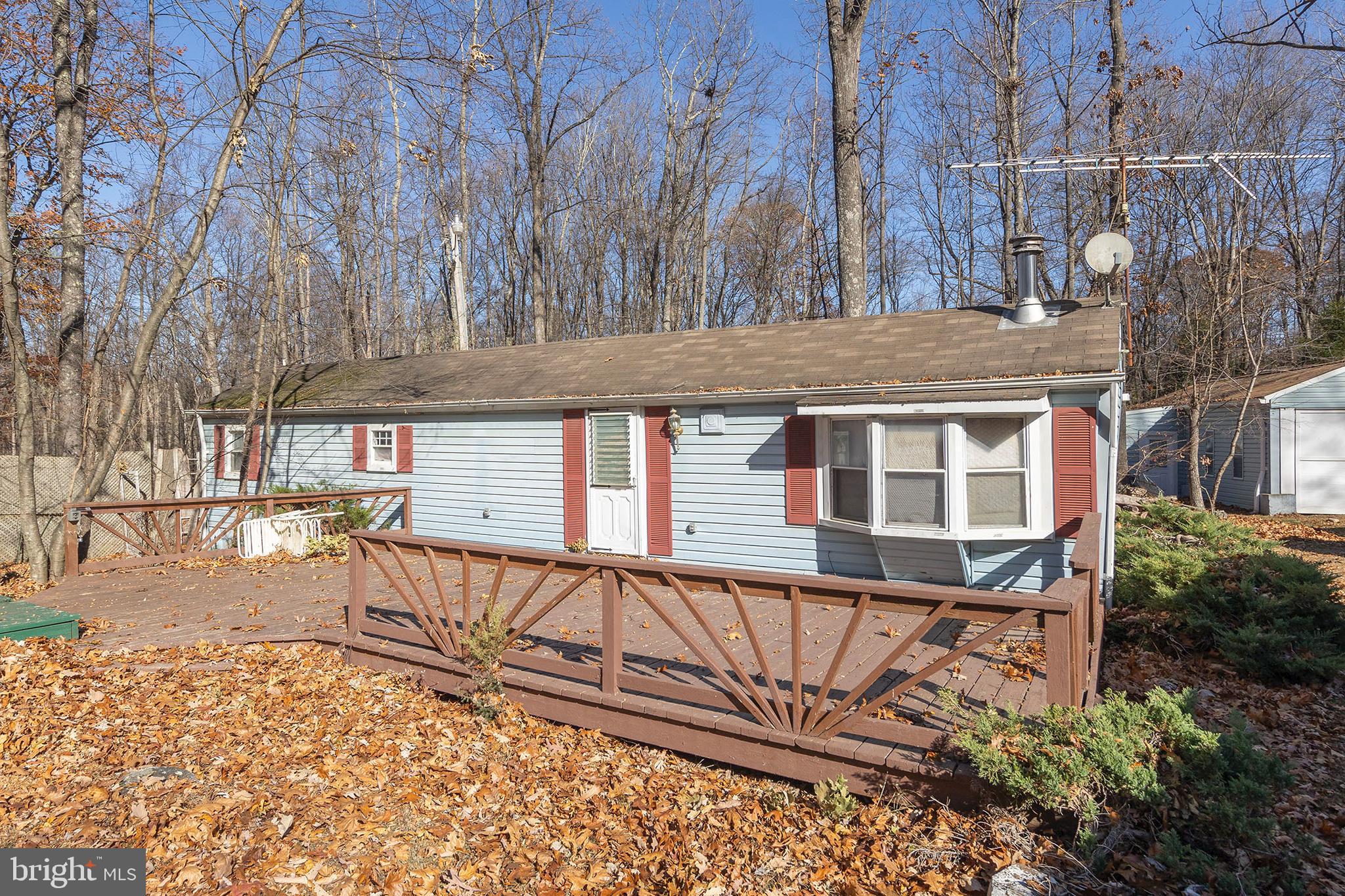 1060 Buffalo Rdg Road Augusta, WV 26704 - Photo 28 of 67 front view of a house with a yard