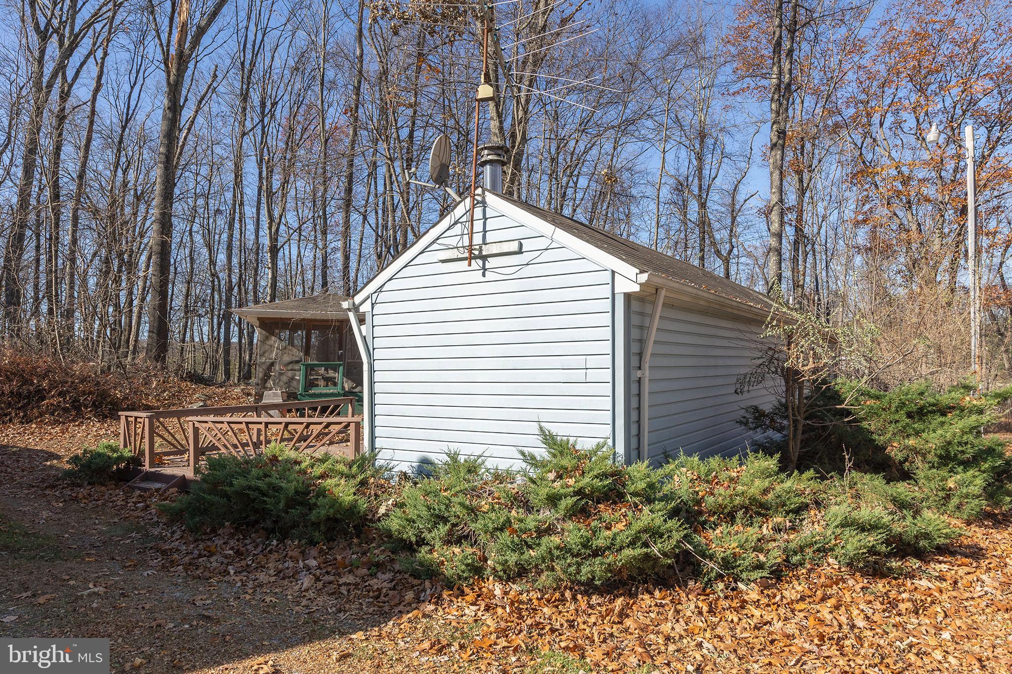 1060 Buffalo Rdg Road Augusta, WV 26704 - Photo 29 of 67 a view of a house with a yard and sitting area