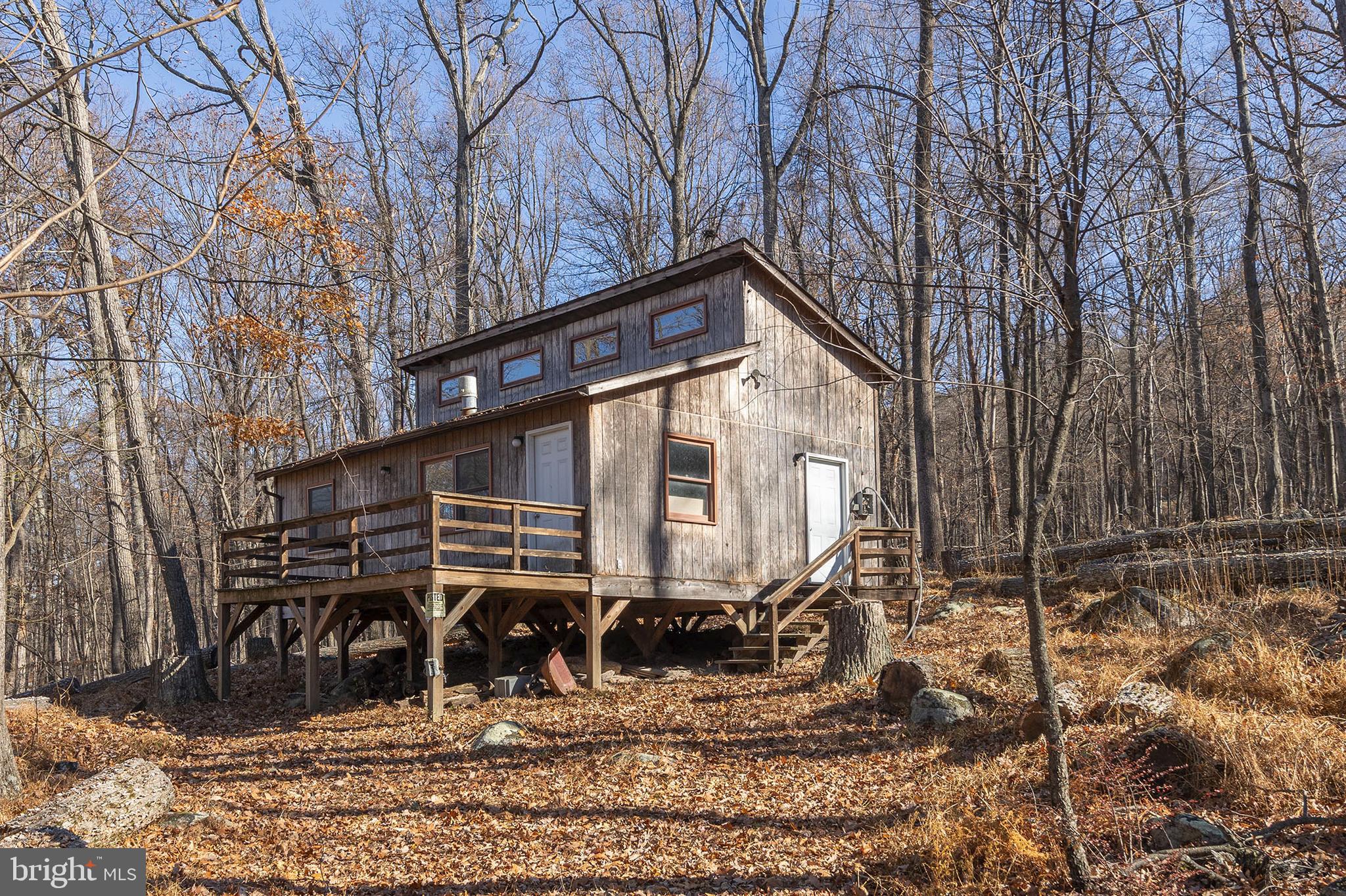 1060 Buffalo Rdg Road Augusta, WV 26704 - Photo 36 of 67 a front view of a house with garden