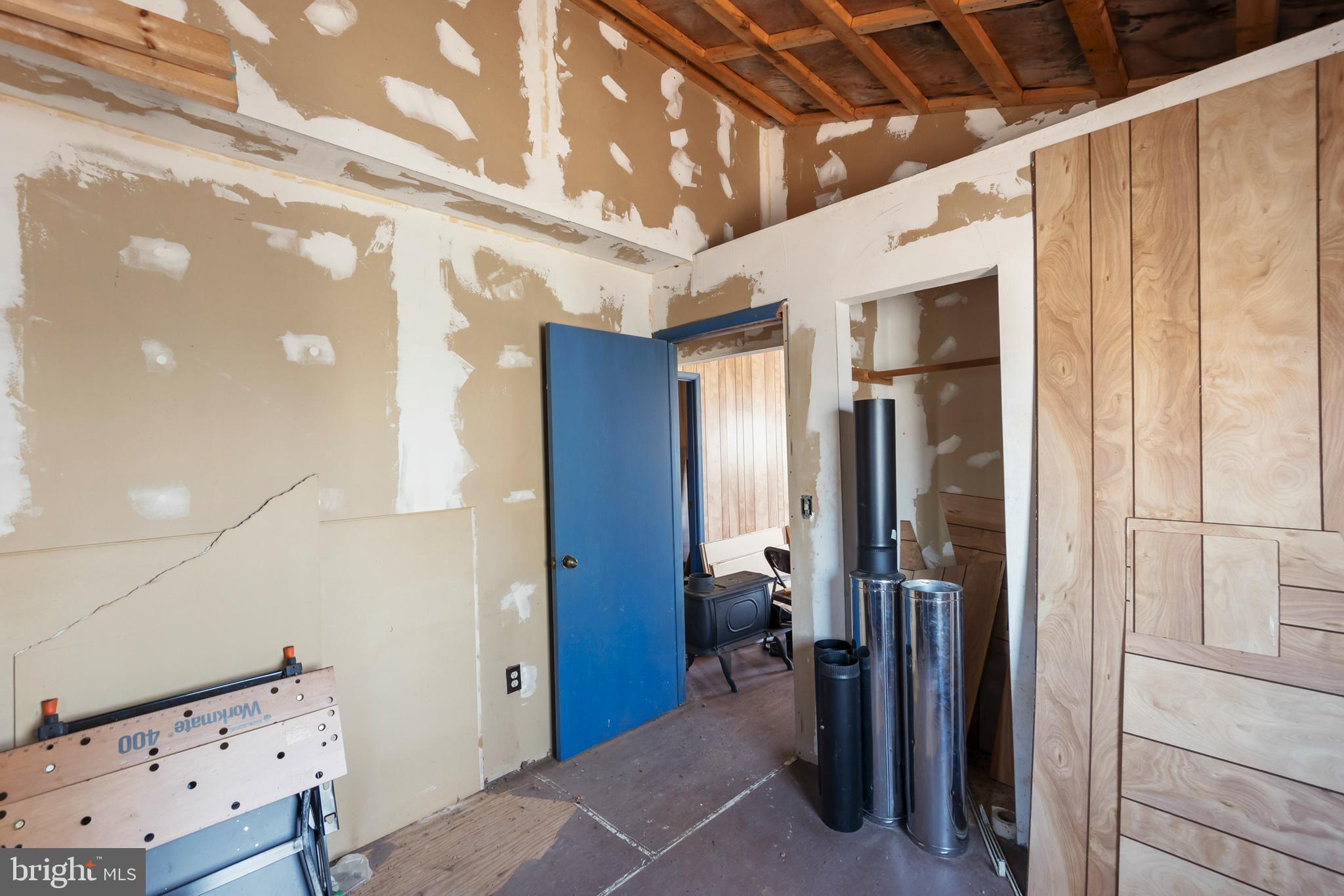 1060 Buffalo Rdg Road Augusta, WV 26704 - Photo 45 of 67 a view of a hallway with living room and utility room