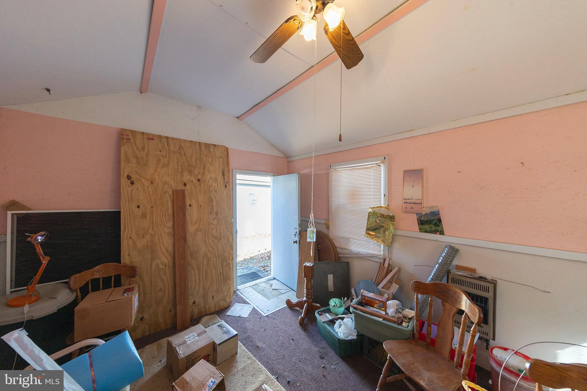1060 Buffalo Rdg Road Augusta, WV 26704 - Photo 63 of 67 a living room with furniture and a flat screen tv