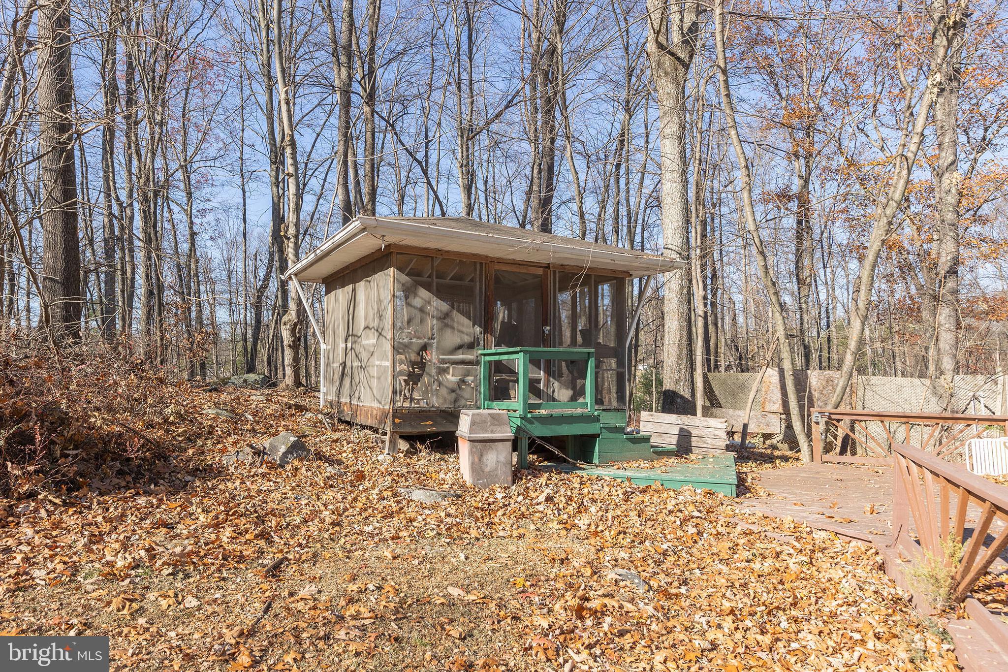 1060 Buffalo Rdg Road Augusta, WV 26704 - Photo 66 of 67 a view of a house with backyard and sitting area