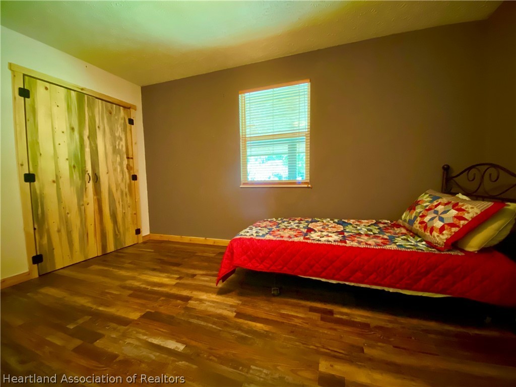 538 Hayman Road Wauchula, FL 33873 - Photo 16 of 21 a bedroom with a bed and a window