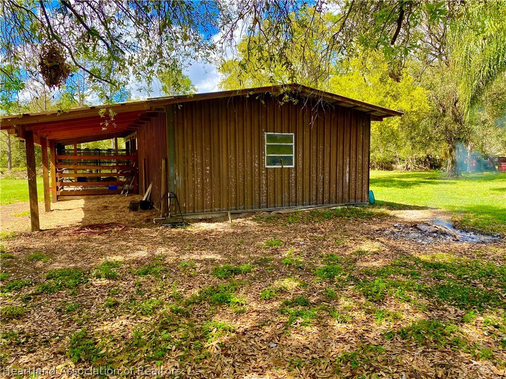 538 Hayman Road Wauchula, FL 33873 - Photo 3 of 21 a view of a house with backyard