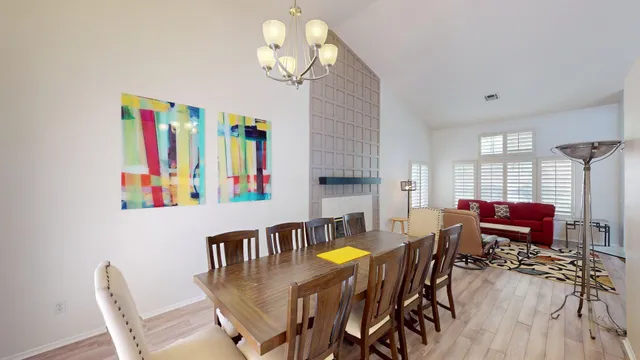 a view of a livingroom with furniture and a window