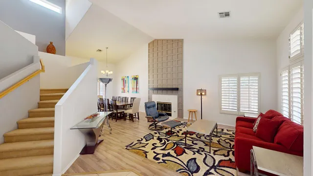 a white refrigerator freezer and a stove sitting inside of a kitchen