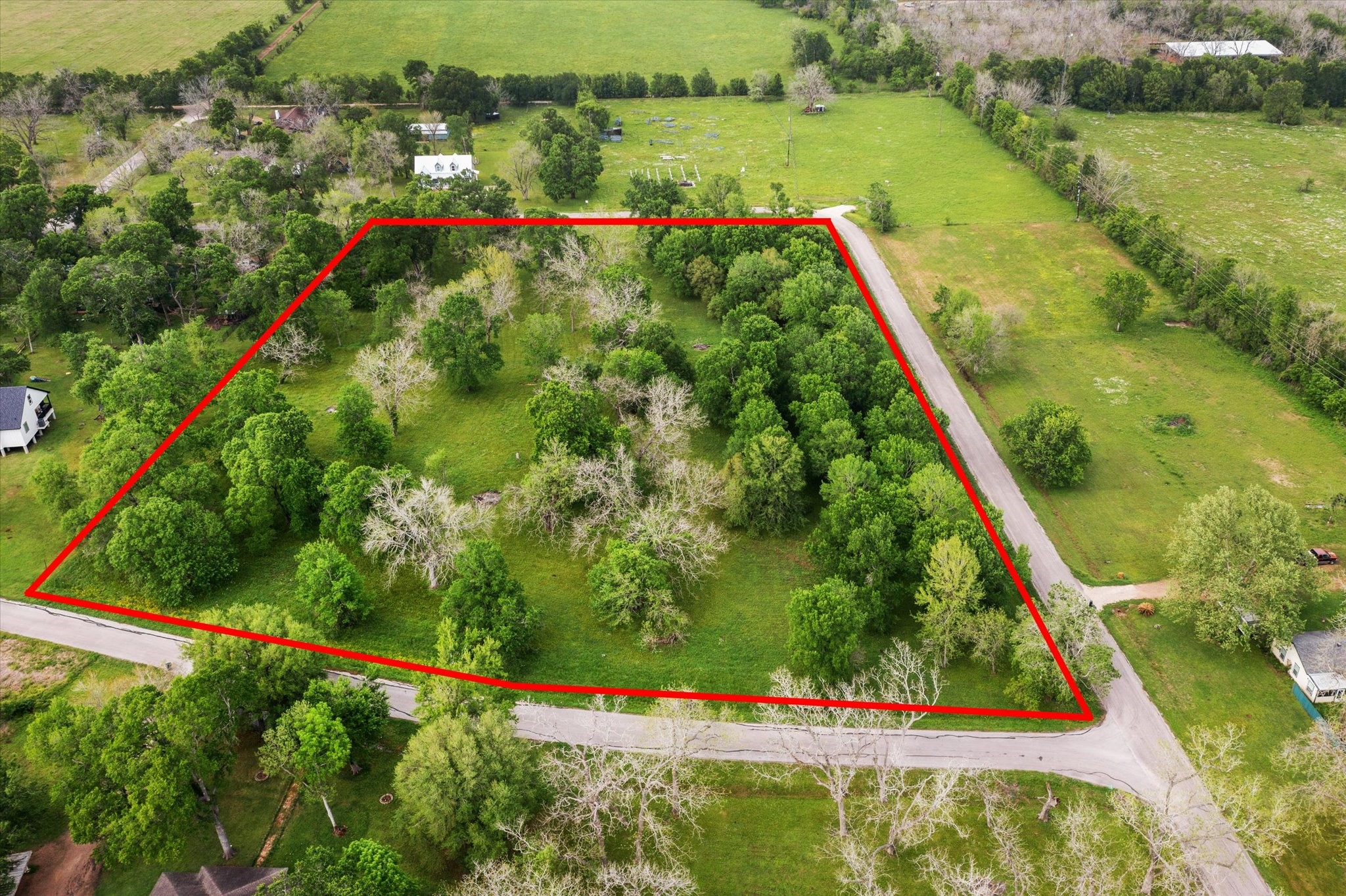 Lot 7-tbd Lot 7-tbd Wagon Road Wallis, TX 77485 - Photo 3 of 13 an aerial view of lake