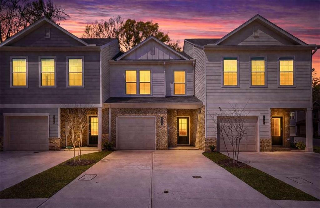 3405 Ripple Loop, Unit 127 South Fulton, GA 30349 - Photo 20 of 26 a front view of a house with yard and parking