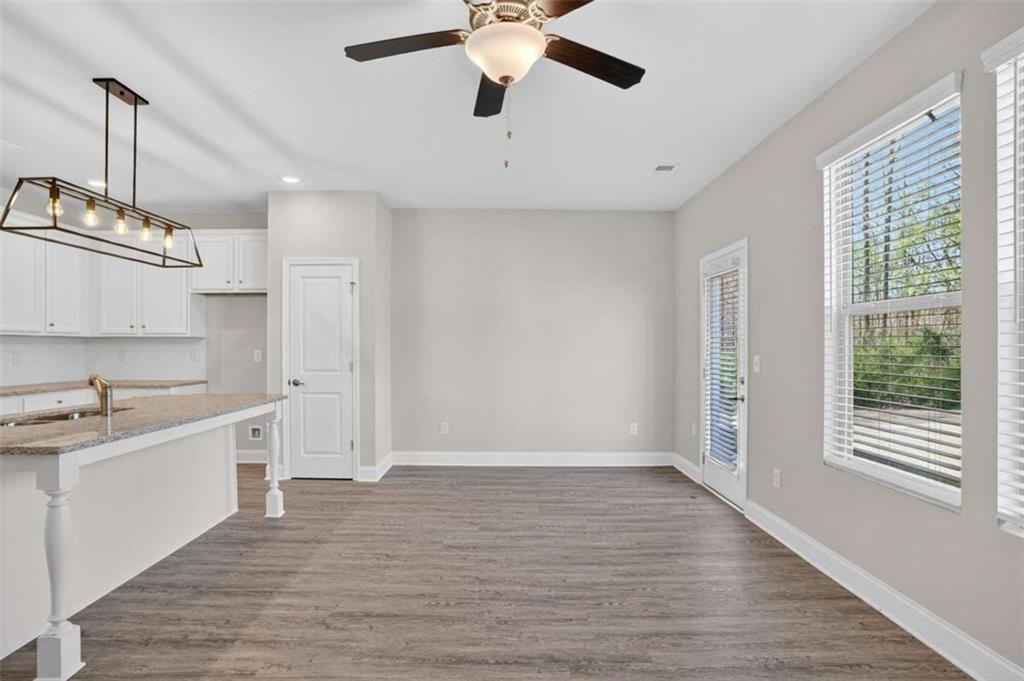 3405 Ripple Loop, Unit 127 South Fulton, GA 30349 - Photo 7 of 26 a view of kitchen with sink microwave and refrigerator