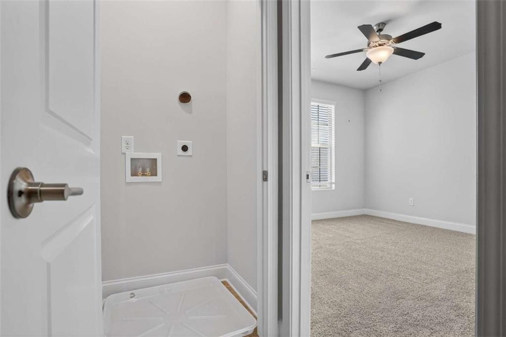 3405 Ripple Loop, Unit 127 South Fulton, GA 30349 - Photo 10 of 26 a view of empty room with a ceiling fan